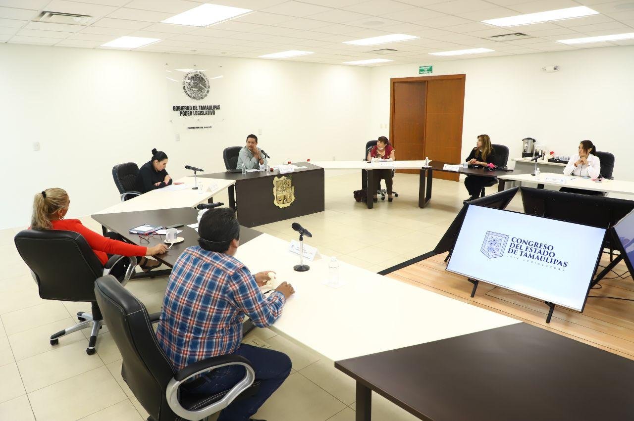 Com. de Salud
